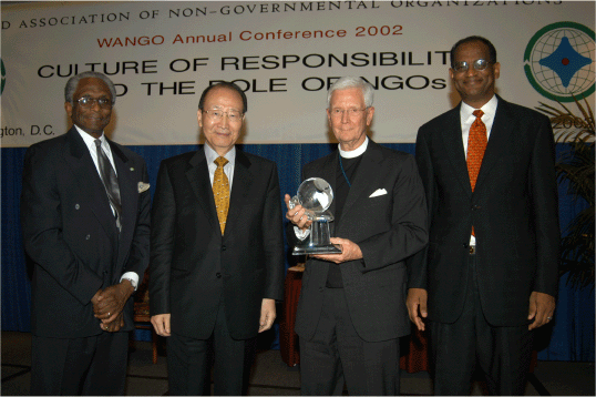 Rev. Sanford Garner receives Bishop Swing/URI award